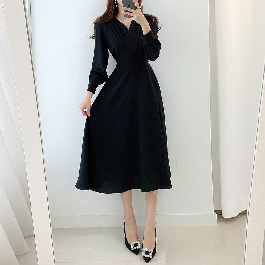 Robe Évasée Chic avec Décolleté en V et Manches Bouffantes