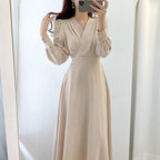 Robe Évasée Chic avec Décolleté en V et Manches Bouffantes