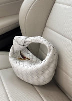 Élégant sac à main tissé